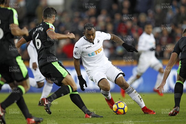 251117 - Swansea City v AFC Bournemouth, Premier League - Jordan Ayew of Swansea City (right) in action with  Andrew Surman of AFC Bournemouth