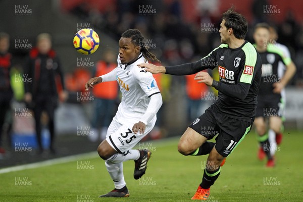 251117 - Swansea City v AFC Bournemouth, Premier League - Renato Sanches of Swansea City (left) in action with Charlie Daniels of AFC Bournemouth