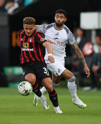 290823 - Swansea City v AFC Bournemouth - Carabao Cup - Max Aarons of Bournemouth is challenged by Josh Ginnelly of Swansea 