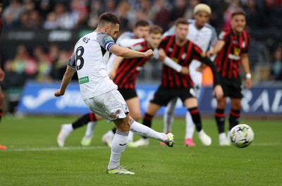 290823 - Swansea City v AFC Bournemouth - Carabao Cup - Matt Grimes of Swansea scores a goal from the penalty spot