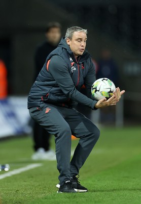 290823 - Swansea City v AFC Bournemouth - Carabao Cup - Swansea City Manager Michael Duff catches the ball