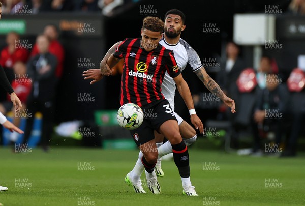 290823 - Swansea City v AFC Bournemouth - Carabao Cup - Max Aarons of Bournemouth is challenged by Josh Ginnelly of Swansea 