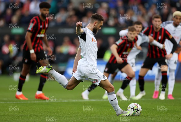 290823 - Swansea City v AFC Bournemouth - Carabao Cup - Matt Grimes of Swansea scores a goal from the penalty spot
