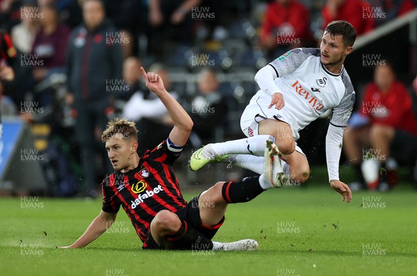 290823 - Swansea City v AFC Bournemouth - Carabao Cup - Liam Cullen of Swansea is tackled by David Brooks of Bournemouth 