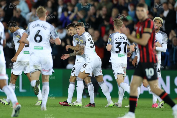 290823 - Swansea City v AFC Bournemouth - Carabao Cup - Jamie Paterson of Swansea celebrates scoring a goal with team mates