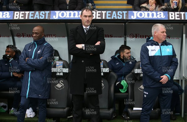 140117 - Swansea City v Arsenal - Premier League - Swansea Coach Claude Makelele, Swansea Manager Paul Clement and Coach Nigel Gibbs by Chris Fairweather/Huw Evans Agency