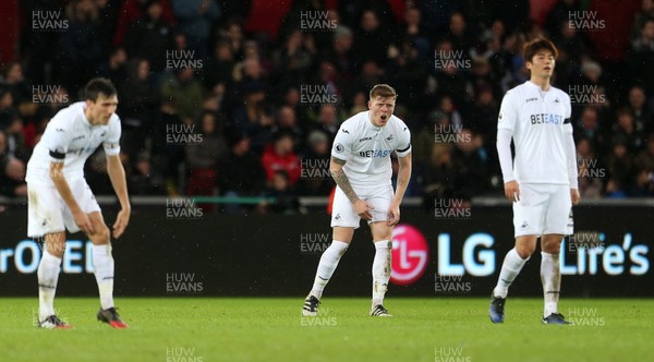 140117 - Swansea City v Arsenal - Premier League -  by Chris Fairweather/Huw Evans Agen