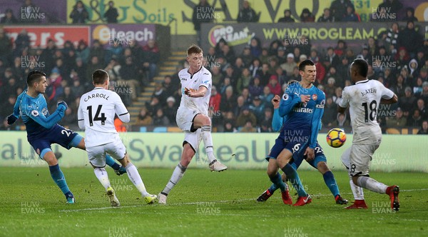 300118 - Swansea City v Arsenal - Premier League - Sam Clucas of Swansea City scores a goal to make it 3-1