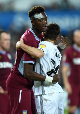 261218 - Swansea City v Aston Villa - SkyBet Championship - Tammy Abraham of Aston Villa and Daniel James of Swansea City after a tackle