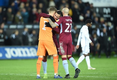 261218 - Swansea City v Aston Villa - SkyBet Championship - Orjan Nyland, Anwar El Ghazi and Alan Hutton of Aston Villa celebrate saving Wilfried Bony of Swansea City shot