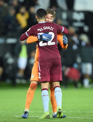 261218 - Swansea City v Aston Villa - SkyBet Championship - Orjan Nyland and Anwar El Ghazi of Aston Villa celebrate saving Wilfried Bony of Swansea City shot