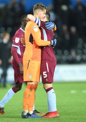 261218 - Swansea City v Aston Villa - SkyBet Championship - Orjan Nyland and James Chester of Aston Villa celebrates