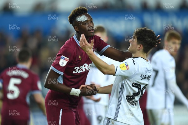 261218 - Swansea City v Aston Villa - SkyBet Championship - Tammy Abraham of Aston Villa and Daniel James of Swansea City after a tackle