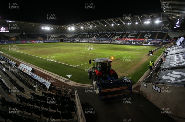 191220 - Swansea City v Barnsley - SkyBet Championship - Tractors move onto the pitch after the game