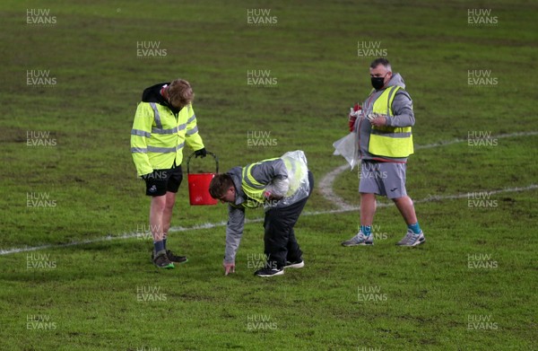 191220 - Swansea City v Barnsley - SkyBet Championship - Pitch staff on the field after the game