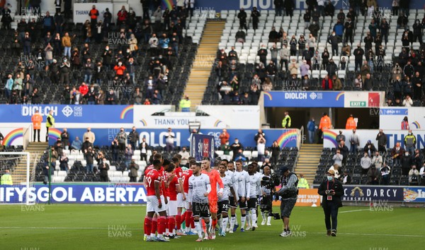 220521 - Swansea City v Barnsley, Sky Bet Championship Play Off Semi Final, Second Leg - The players line up in front of fans in Wales for the first in over a year