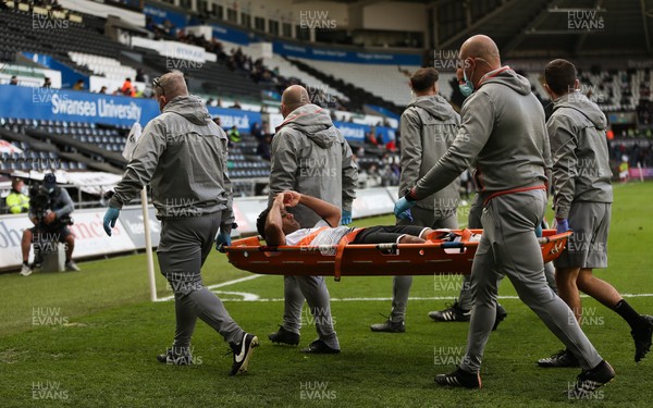 220521 - Swansea City v Barnsley, Sky Bet Championship Play Off Semi Final, Second Leg - Wayne Routledge of Swansea City is stretchered off after picking up an injury in the second half