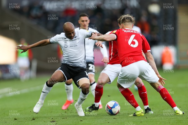 220521 - Swansea City v Barnsley, Sky Bet Championship Play Off Semi Final, Second Leg - Andre Ayew of Swansea City holds off Mads Andersen of Barnsley