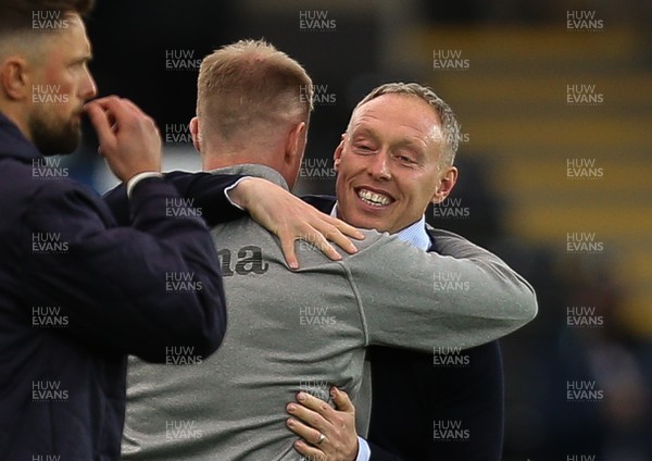 220521 - Swansea City v Barnsley, Sky Bet Championship Play Off Semi Final, Second Leg - Swansea City head coach Steve Cooper embraces coach Alan Tate on the final whistle as Swansea beat Barnsley to reach the Championship Play Off Final