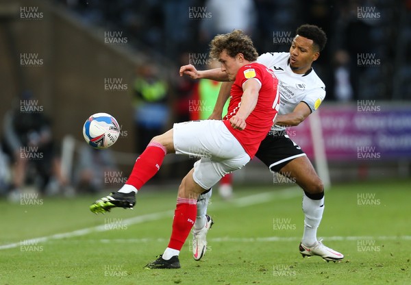 220521 - Swansea City v Barnsley, Sky Bet Championship Play Off Semi Final, Second Leg - Callum Styles of Barnsley and Korey Smith of Swansea City compete for the ball