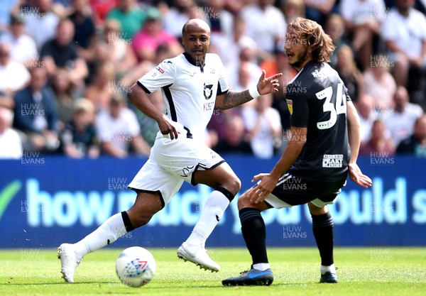250819 - Swansea City v Birmingham - SkyBet Championship - Andre Ayew of Swansea City gets the ball away