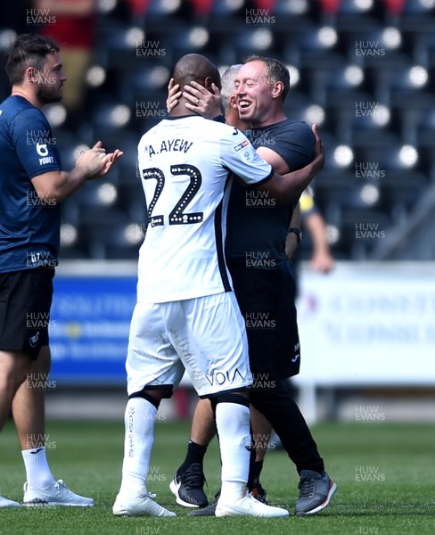 250819 - Swansea City v Birmingham - SkyBet Championship - Swansea manager Steve Cooper celebrates win with Andre Ayew of Swansea City