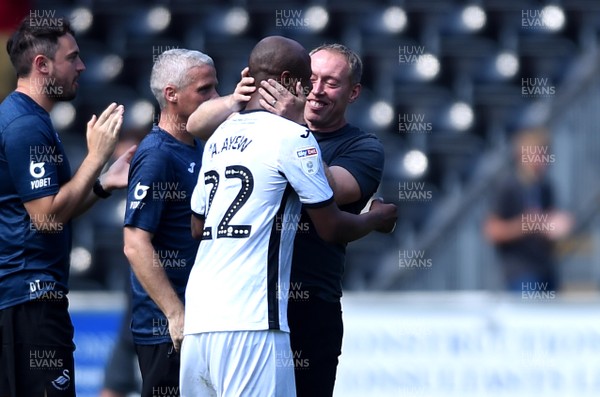 250819 - Swansea City v Birmingham - SkyBet Championship - Swansea manager Steve Cooper celebrates win with Andre Ayew of Swansea City