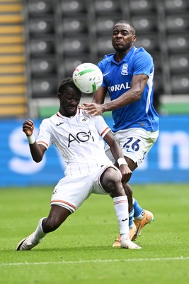 080826 - Swansea City v Birmingham City - Carabao Cup First Round - Moussa Yeo of Swansea City is challenged by Bright Osayi-Samuel of Birmingham City