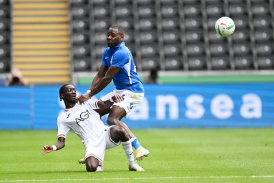 080826 - Swansea City v Birmingham City - Carabao Cup First Round - Moussa Yeo of Swansea City is challenged by Bright Osayi-Samuel of Birmingham City