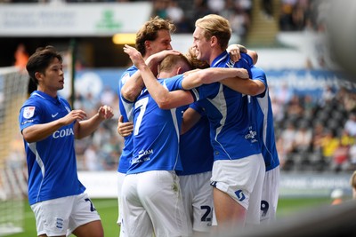 080826 - Swansea City v Birmingham City - Carabao Cup First Round - August Priske of Birmingham City celebrates scoring a goal with team mates