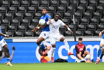 080826 - Swansea City v Birmingham City - Carabao Cup First Round - Jhon Solis of Birmingham City is challenged by Jospeh Opoku of Swansea City