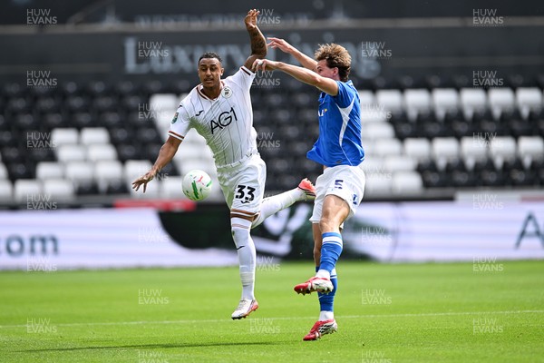 080826 - Swansea City v Birmingham City - Carabao Cup First Round - Adam Idah of Swansea City is challenged by Phil Neumann of Birmingham City
