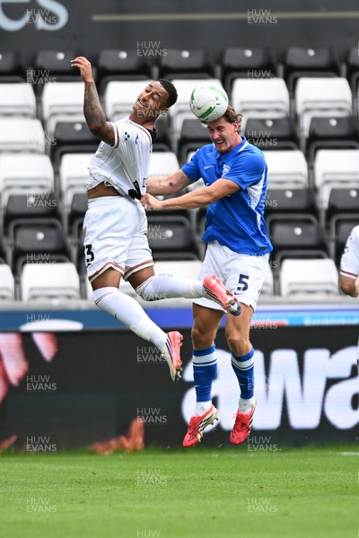080826 - Swansea City v Birmingham City - Carabao Cup First Round - Adam Idah of Swansea City is challenged by Phil Neumann of Birmingham City