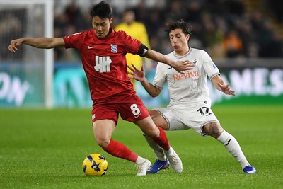 170126 - Swansea City v Birmingham City - Sky Bet Championship - Goncalo Franco of Swansea City is challenged by Paik Seung-Ho of Birmingham