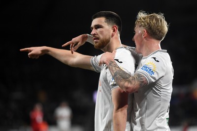 170126 - Swansea City v Birmingham City - Sky Bet Championship - Zan Vipotnik of Swansea City celebrates scoring a goal with team mates