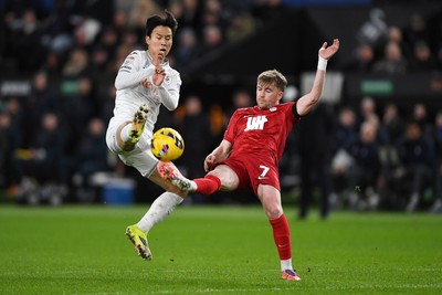 170126 - Swansea City v Birmingham City - Sky Bet Championship - Eom Ji-Sung of Swansea City is challenged by Tommy Doyle of Birmingham
