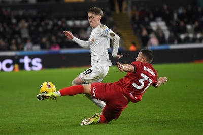 170126 - Swansea City v Birmingham City - Sky Bet Championship - Ethan Galbraith of Swansea City is challenged by Kai Wagner of Birmingham