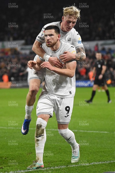 170126 - Swansea City v Birmingham City - Sky Bet Championship - Zan Vipotnik of Swansea City celebrates scoring a goal with team mates