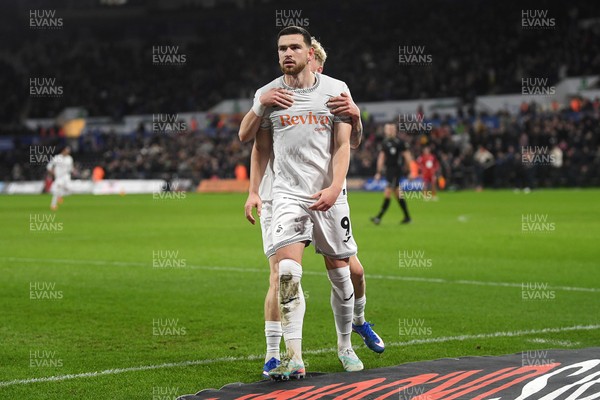 170126 - Swansea City v Birmingham City - Sky Bet Championship - Zan Vipotnik of Swansea City celebrates scoring a goal with team mates