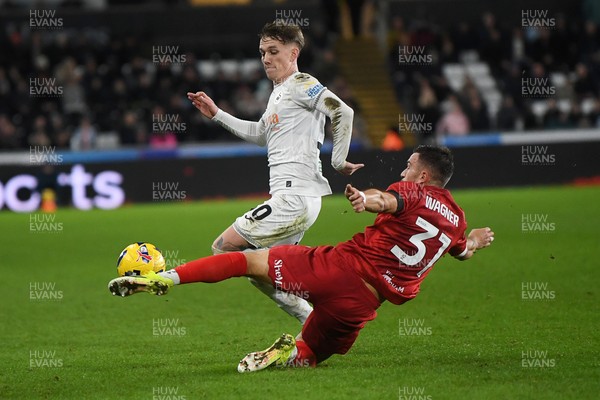 170126 - Swansea City v Birmingham City - Sky Bet Championship - Ethan Galbraith of Swansea City is challenged by Kai Wagner of Birmingham