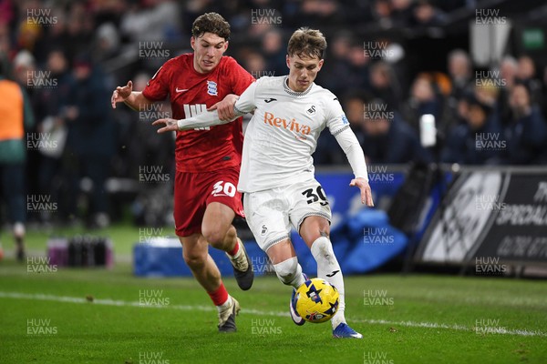 170126 - Swansea City v Birmingham City - Sky Bet Championship - Ethan Galbraith of Swansea City is challenged by Lewis Koumas of Birmingham