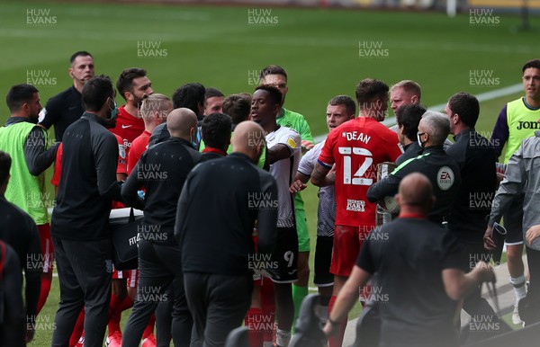 190920 - Swansea City v Birmingham City - SkyBet Championship - Swansea Assistant Manager Alan Tate being pushed away by Birmingham City Manager Aitor Karanka and players after his confrontation with Jon Toral of Birmingham at half time