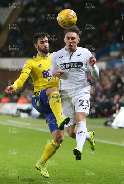 290119 - Swansea City v Birmingham City - SkyBet Championship - Connor Roberts of Swansea City is tackled by Maxime Colin of Birmingham City