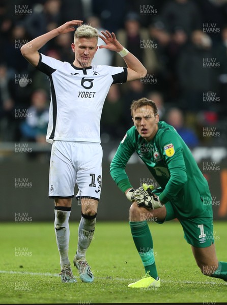 111219 - Swansea City v Blackburn Rovers - SkyBet Championship - A frustrated Sam Surridge of Swansea City after his shot at goal goes wide of keeper Christian Walton of Blackburn Rovers