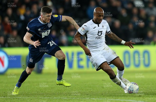 111219 - Swansea City v Blackburn Rovers - SkyBet Championship - Andre Ayew of Swansea City is challenged by Darragh Lenihan of Blackburn Rovers