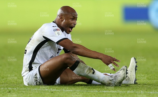 111219 - Swansea City v Blackburn Rovers - SkyBet Championship - A frustrated Andre Ayew of Swansea City shows his boot to the referee after missing a shot at goal
