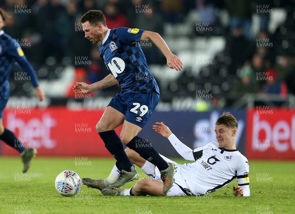 111219 - Swansea City v Blackburn Rovers - SkyBet Championship - Corry Evans of Blackburn Rovers is tackled by George Byers of Swansea City