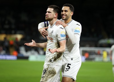 200126 - Swansea City v Blackburn Rovers - SkyBet Championship - Zan Vipotnik of Swansea City celebrates scoring a goal with Ben Cabango