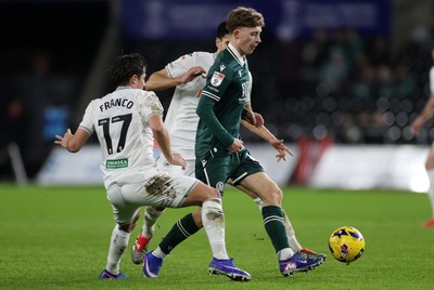 200126 - Swansea City v Blackburn Rovers - SkyBet Championship - Aodhan Doherty of Blackburn Rovers is tackled by Goncalo Franco of Swansea City 