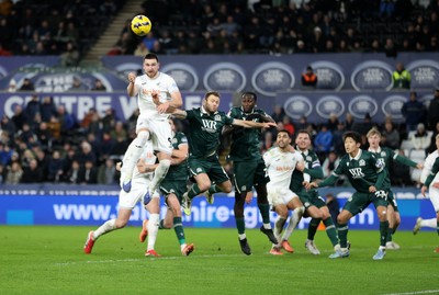 200126 - Swansea City v Blackburn Rovers - SkyBet Championship - Zan Vipotnik of Swansea City headers the ball to score a goal